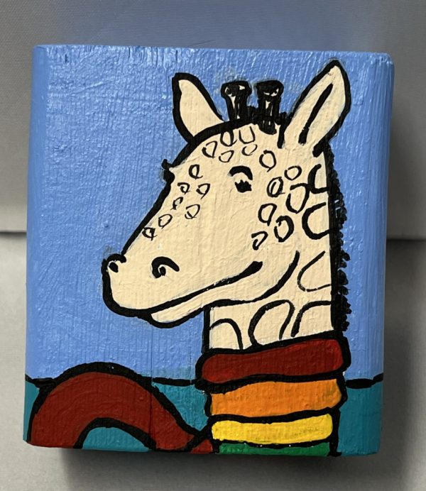 painting of a giraffe in a multicolored scarf