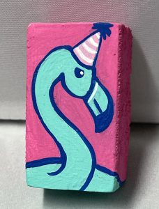 tiny painting of a flamingo in a party hat
