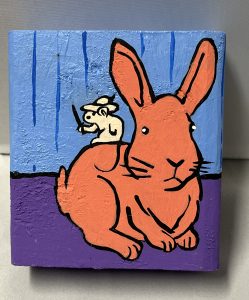 Painting of a mouse on a bunny