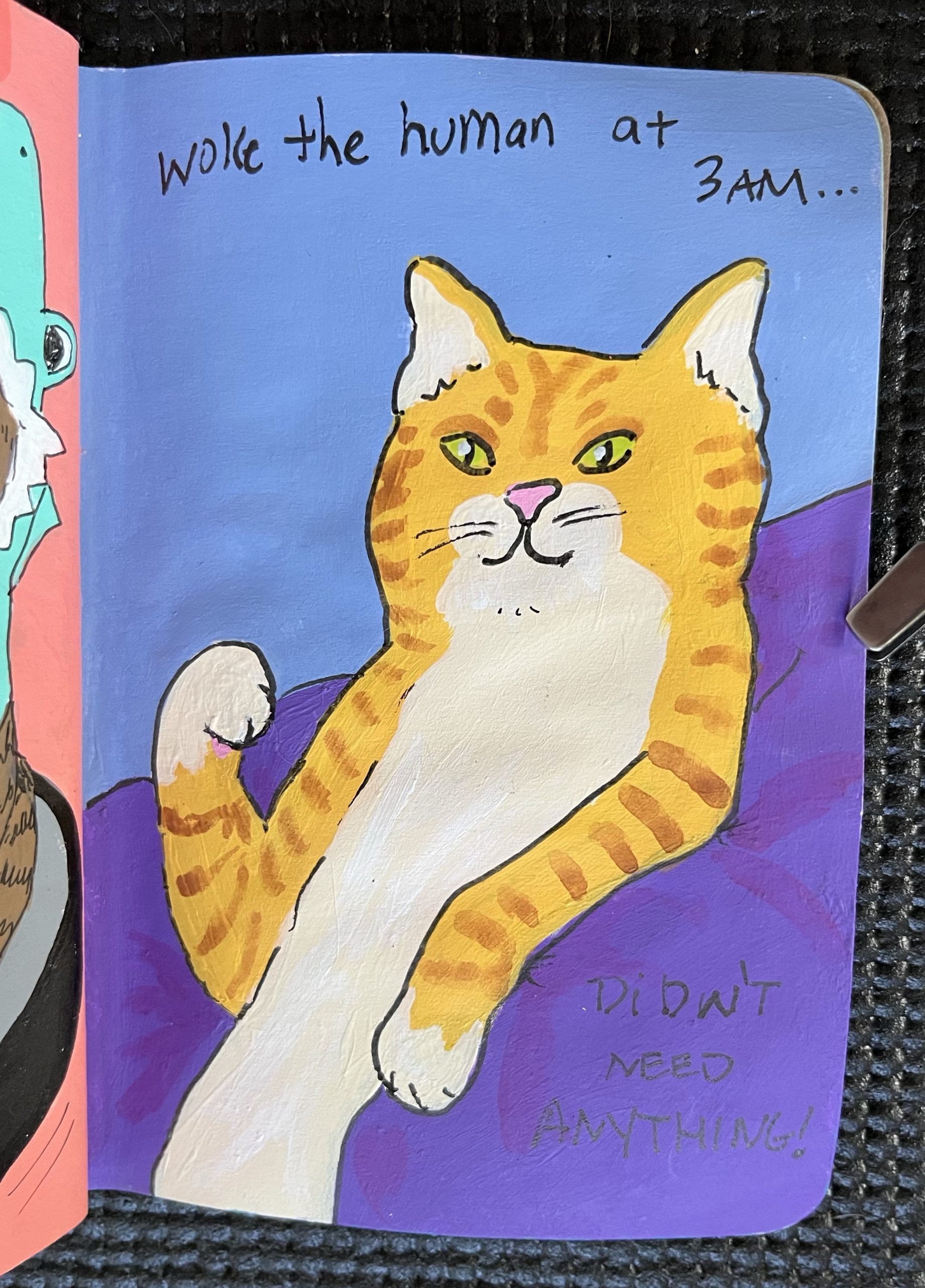 Painted page of a triumphant orange cat with paw fist raised.